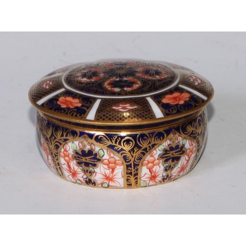 613 - A Royal Crown Derby 1128 pattern lozenge shaped dressing table box and cover, 11cm wide, printed mar... 