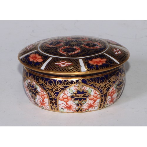 613 - A Royal Crown Derby 1128 pattern lozenge shaped dressing table box and cover, 11cm wide, printed mar... 