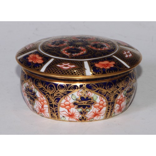 613 - A Royal Crown Derby 1128 pattern lozenge shaped dressing table box and cover, 11cm wide, printed mar... 