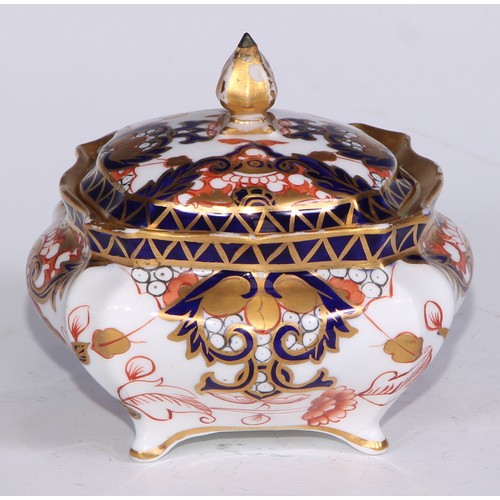 605 - A pair of Royal Crown Derby Imari square bombe shaped boxes and covers, 8cm wide, printed marks; ano... 