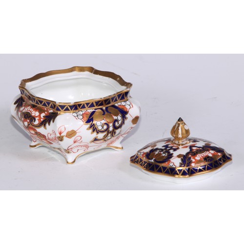 605 - A pair of Royal Crown Derby Imari square bombe shaped boxes and covers, 8cm wide, printed marks; ano... 