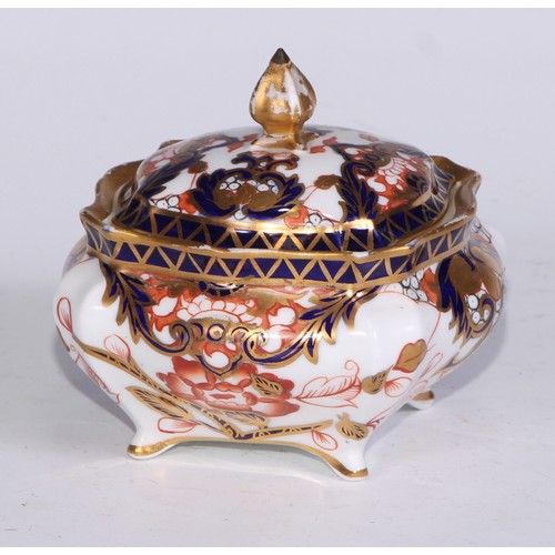 605 - A pair of Royal Crown Derby Imari square bombe shaped boxes and covers, 8cm wide, printed marks; ano... 