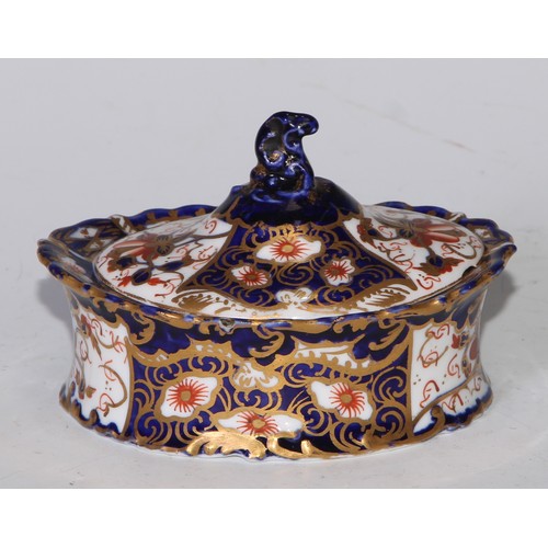 605 - A pair of Royal Crown Derby Imari square bombe shaped boxes and covers, 8cm wide, printed marks; ano... 