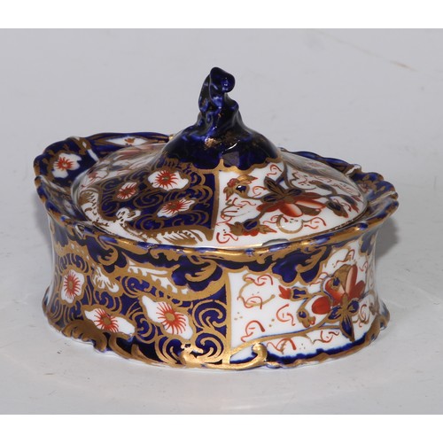 605 - A pair of Royal Crown Derby Imari square bombe shaped boxes and covers, 8cm wide, printed marks; ano... 