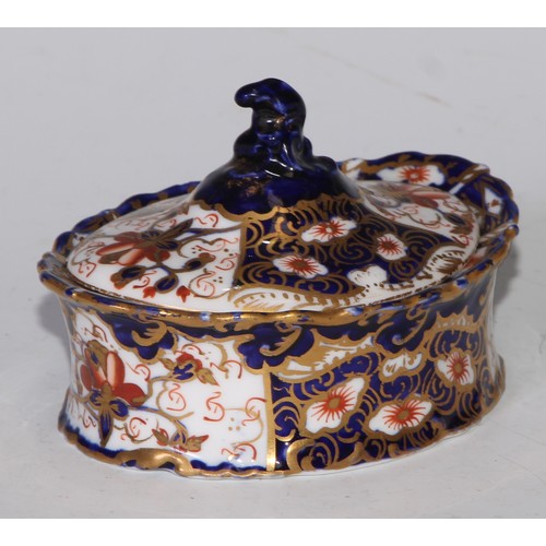 605 - A pair of Royal Crown Derby Imari square bombe shaped boxes and covers, 8cm wide, printed marks; ano... 