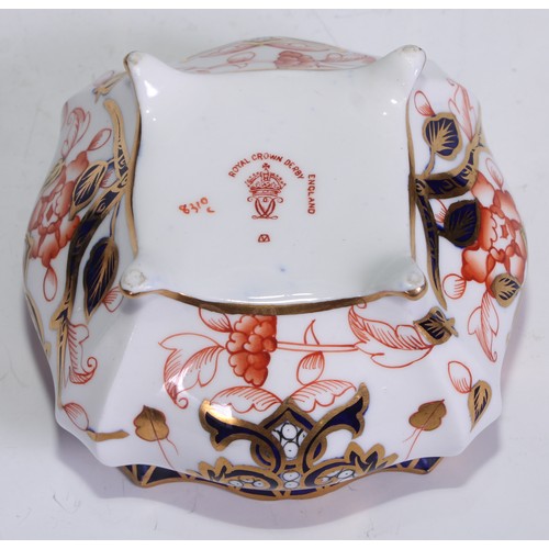 605 - A pair of Royal Crown Derby Imari square bombe shaped boxes and covers, 8cm wide, printed marks; ano... 