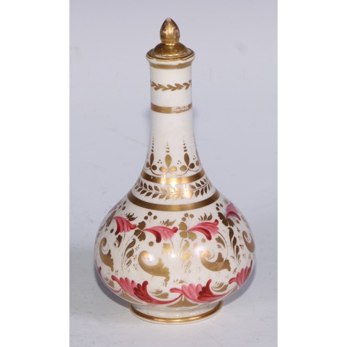 708 - A pair of Derby compressed globular scent bottles, decorated in pink and gilt with flowers and scrol... 