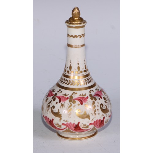 708 - A pair of Derby compressed globular scent bottles, decorated in pink and gilt with flowers and scrol... 