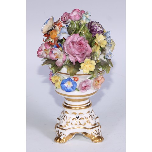 782 - A Sampson Hancock Derby faux potpourri, decorated and encrusted with colourful summer flowers, 16cm ... 