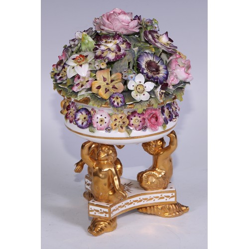 781 - A Sampson Hancock Derby faux pot pourri, encrusted with summer flowers, triform base with merman sup... 