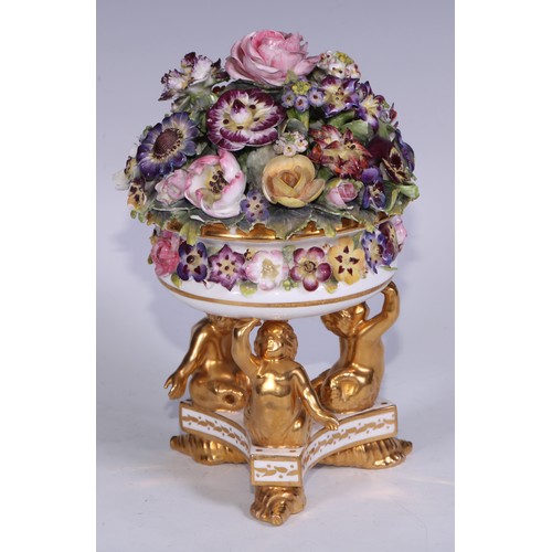 781 - A Sampson Hancock Derby faux pot pourri, encrusted with summer flowers, triform base with merman sup... 