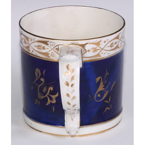 684 - A Derby named view porter mug, View on the River Dove, in gilt on a cobalt blue ground, 11.5cm high,... 