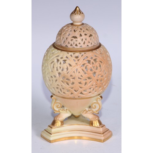 806 - A Grainger & Co Worcester blush ivory ovoid reticulated pot pourri, outlined in gilt, incurved trifo... 