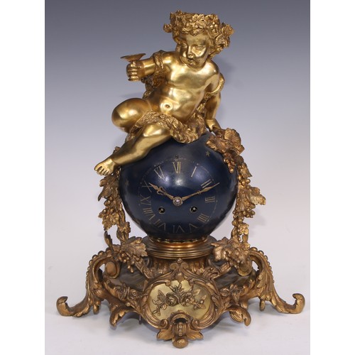 541 - A Napoleon III ormolu and japanned mantel clock, cast as a Bacchic putto atop a celestial orb draped... 