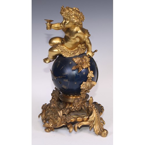 541 - A Napoleon III ormolu and japanned mantel clock, cast as a Bacchic putto atop a celestial orb draped... 