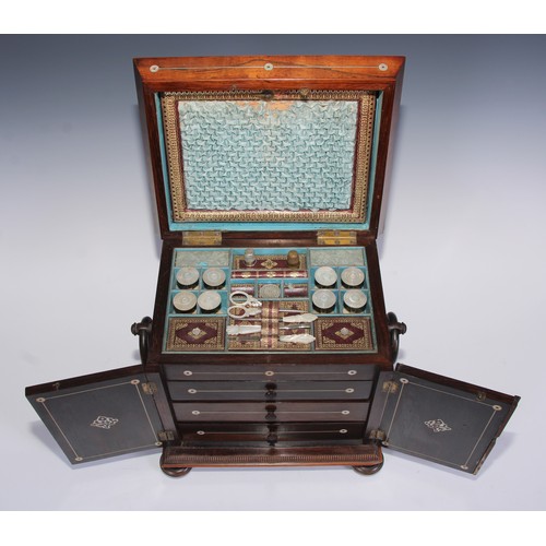 387 - A George IV rosewood and mother of pearl sarcophagus table cabinet, hinged cover above a pair of doo... 