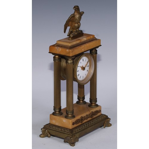 463 - A French Empire design gilt bronze and sienna marble portico timepiece, of small proportions, 5cm en... 