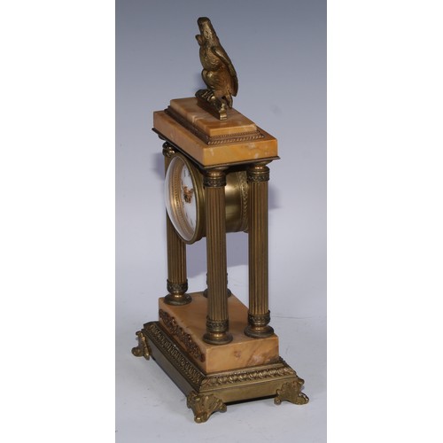 463 - A French Empire design gilt bronze and sienna marble portico timepiece, of small proportions, 5cm en... 