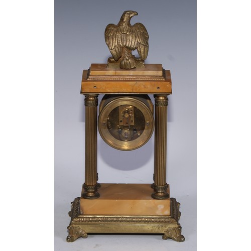 463 - A French Empire design gilt bronze and sienna marble portico timepiece, of small proportions, 5cm en... 