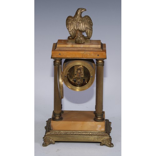 463 - A French Empire design gilt bronze and sienna marble portico timepiece, of small proportions, 5cm en... 