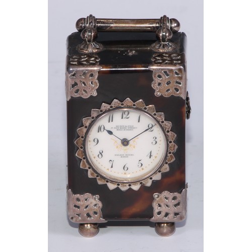 531 - A French silver coloured metal mounted tortoiseshell miniature carriage timepiece, 3cm, enamel clock... 