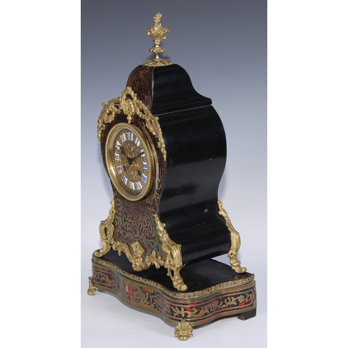 337 - A 19th century French boulle cartouche shaped mantel clock, 10cm circular dial inscribed with Roman ... 