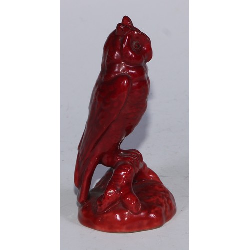 724 - A Bernard Moore flambe model, of an owl perched on a root, 9cm high, impressed mark