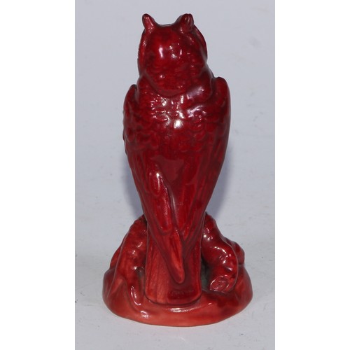 724 - A Bernard Moore flambe model, of an owl perched on a root, 9cm high, impressed mark