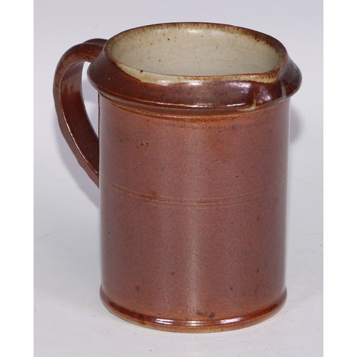 747 - A Royal Doulton brown and buff salt glazed stoneware ovoid harvest jug, typically sprigged with joll... 