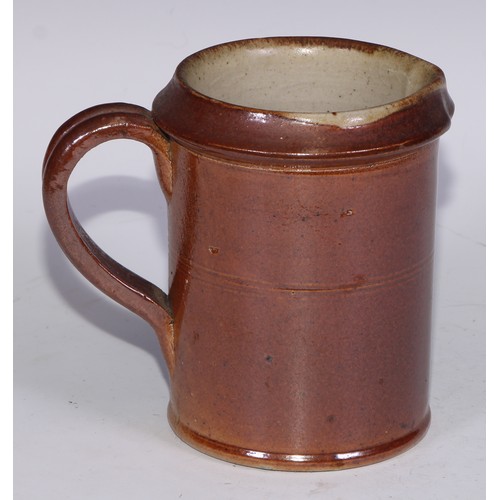 747 - A Royal Doulton brown and buff salt glazed stoneware ovoid harvest jug, typically sprigged with joll... 