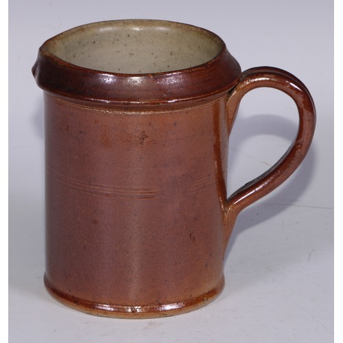 747 - A Royal Doulton brown and buff salt glazed stoneware ovoid harvest jug, typically sprigged with joll... 