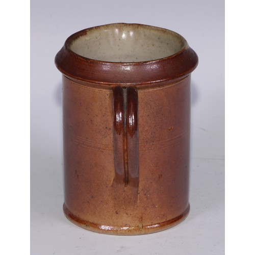 747 - A Royal Doulton brown and buff salt glazed stoneware ovoid harvest jug, typically sprigged with joll... 