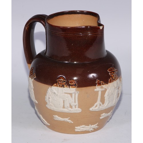 747 - A Royal Doulton brown and buff salt glazed stoneware ovoid harvest jug, typically sprigged with joll... 