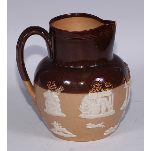 747 - A Royal Doulton brown and buff salt glazed stoneware ovoid harvest jug, typically sprigged with joll... 