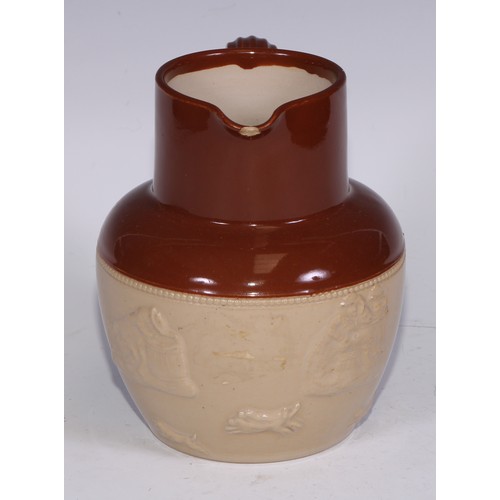 747 - A Royal Doulton brown and buff salt glazed stoneware ovoid harvest jug, typically sprigged with joll... 