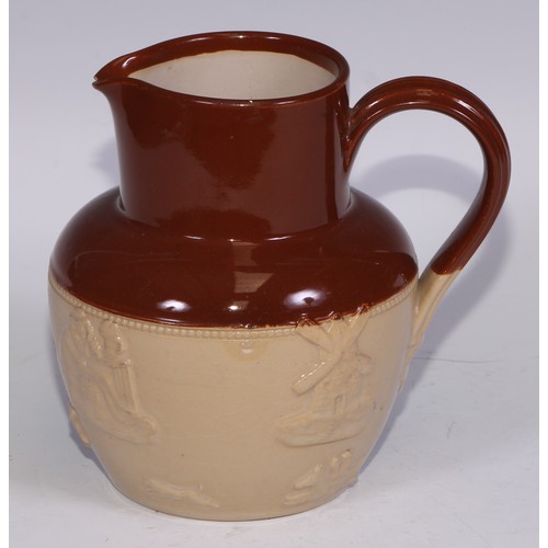 747 - A Royal Doulton brown and buff salt glazed stoneware ovoid harvest jug, typically sprigged with joll... 