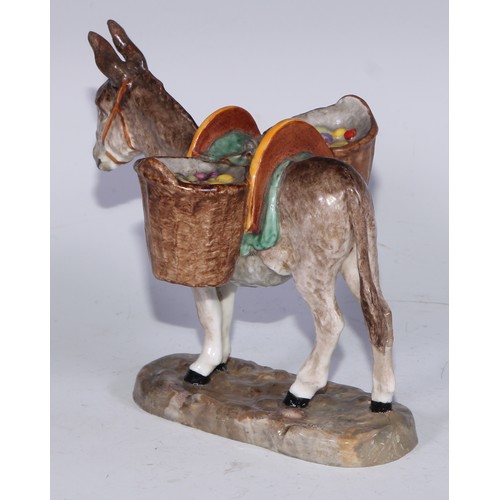 608 - A rare Royal Crown Derby model, Festino lente, modelled by Miss M.R. Locke, the donkey walks laden w... 