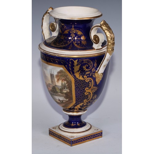 685 - A Derby named view two-handled ovoid pedestal vase, painted with a view of Derby, in gilt with acant... 