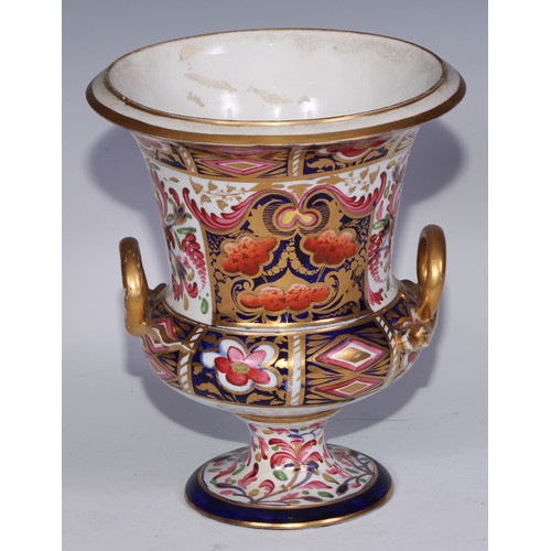 700 - A garniture of three Derby campana vases, painted in the Imari palette, the largest 20.5cm high, red... 