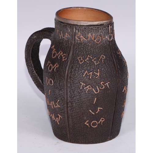 731 - A Doulton Slater's Patent salt glazed stoneware beer jug, as a leatherjack, decorated with The Landl... 