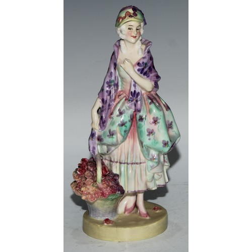 753 - A Royal Doulton figure, Spring Flowers, 18.5cm high, HN1807; others, Phyllis and The Bridesmaid (3)