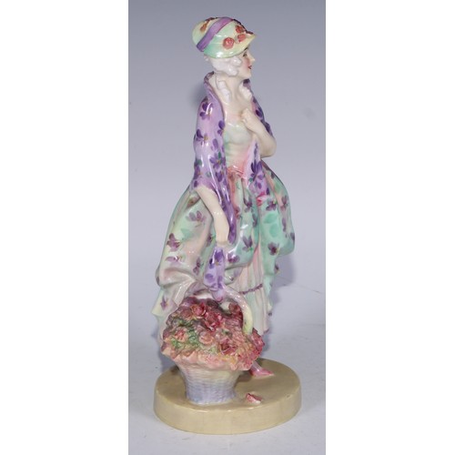 753 - A Royal Doulton figure, Spring Flowers, 18.5cm high, HN1807; others, Phyllis and The Bridesmaid (3)