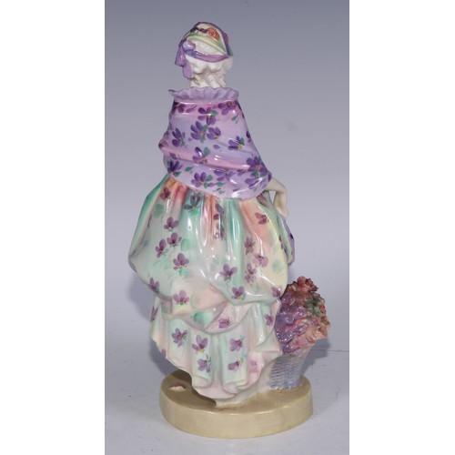 753 - A Royal Doulton figure, Spring Flowers, 18.5cm high, HN1807; others, Phyllis and The Bridesmaid (3)