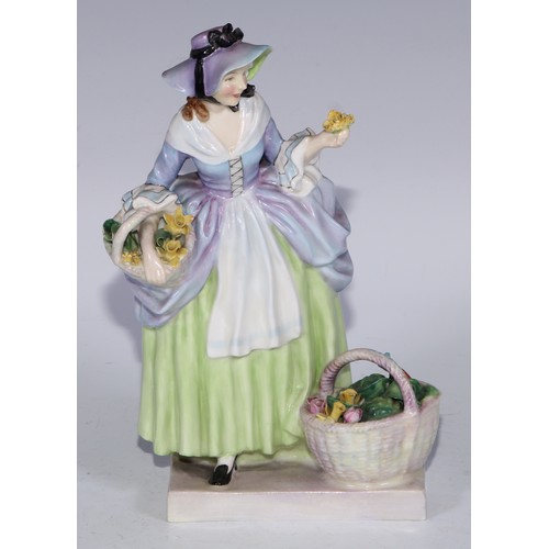 753 - A Royal Doulton figure, Spring Flowers, 18.5cm high, HN1807; others, Phyllis and The Bridesmaid (3)