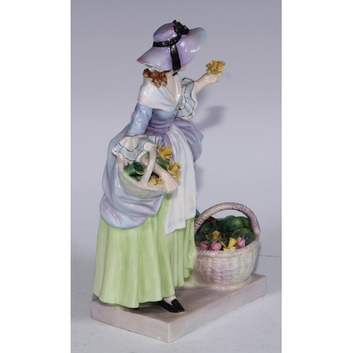 753 - A Royal Doulton figure, Spring Flowers, 18.5cm high, HN1807; others, Phyllis and The Bridesmaid (3)