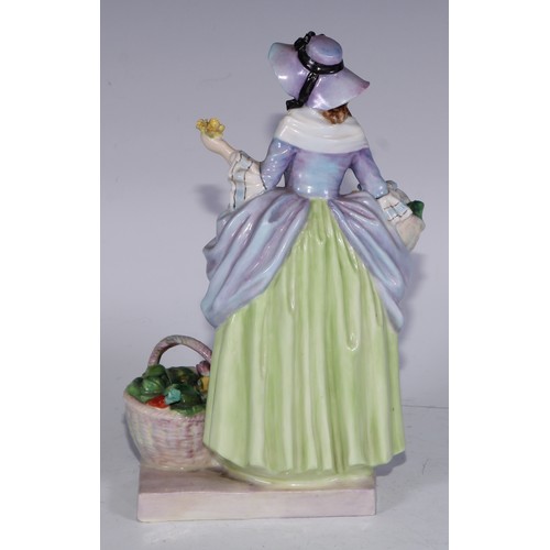 753 - A Royal Doulton figure, Spring Flowers, 18.5cm high, HN1807; others, Phyllis and The Bridesmaid (3)