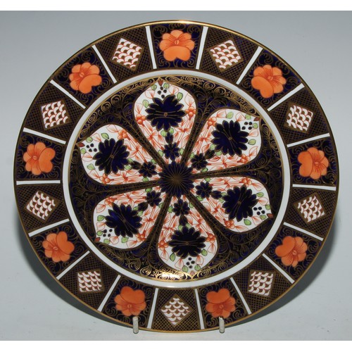 611 - A Royal Crown Derby 1128 pattern dinner plate, 27cm diam, printed mark; another plate, 23.5cm diam; ... 