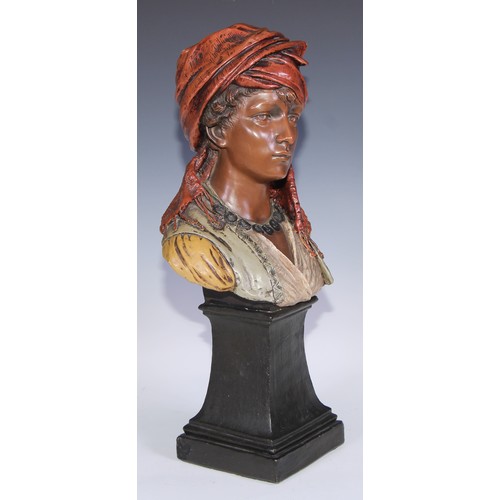 762 - A Goldscheider Art Nouveau terracotta bust, of a young girl in Eastern dress, spreading square socle... 