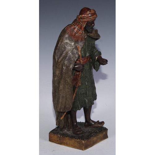 763 - A pair of Goldscheider Orientalist terracotta figures, of an Arab lady and gentleman, , 38.5cm high,... 