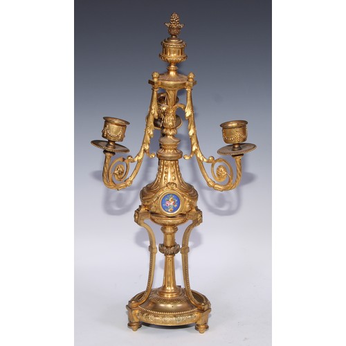 390 - A pair of 19th century French porcelain mounted gilt metal three-light candelabra, in the Louis XVI ... 